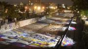 Imagen de Reconocen colaboración del CMN en instalación Artedeluz en Río Mapocho